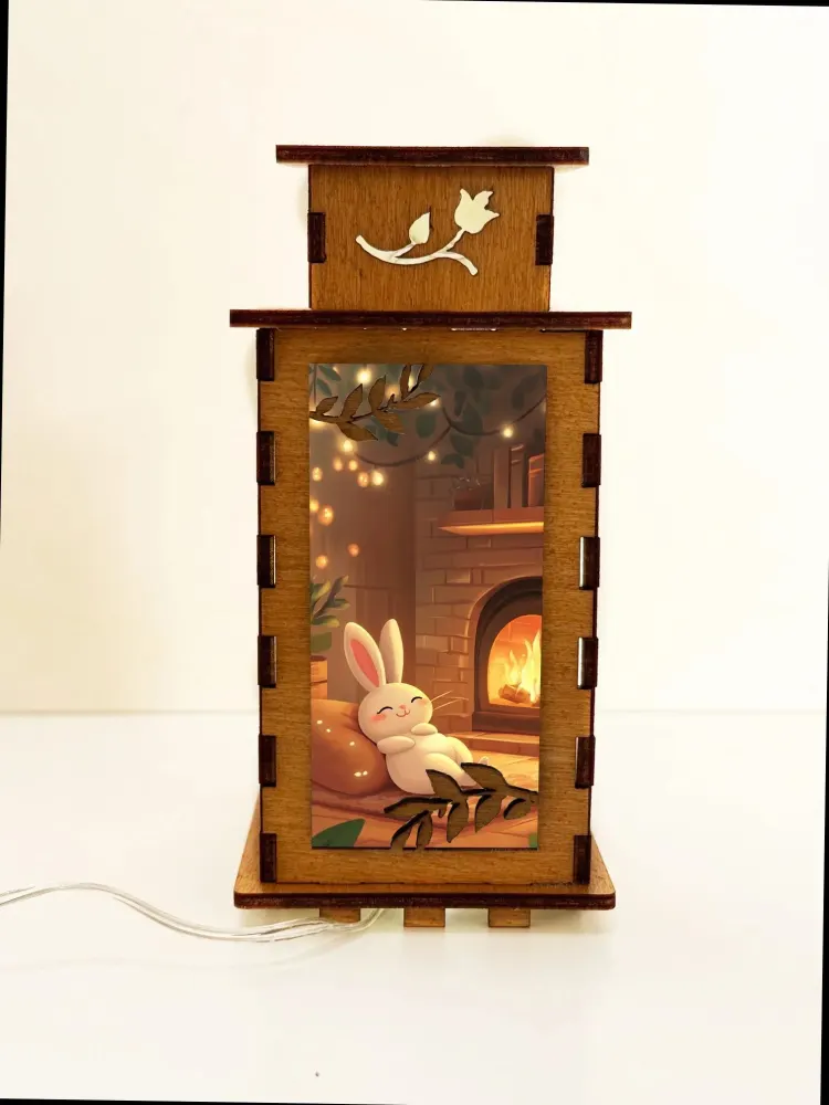 Artisan wooden night lamp illuminated in a dark room